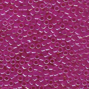 DB1744 Miyuki delica beads - fuchsia lined opal AB